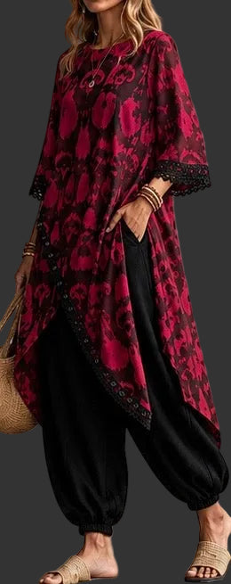 bohemian-style tunic top with a red and black floral pattern, paired with black harem pants,